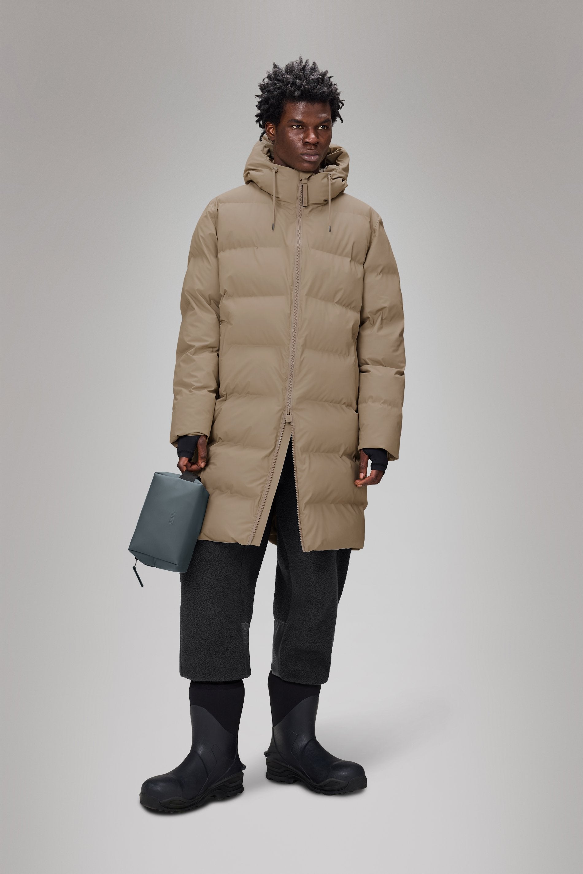 Rains - Cleaner Winterparka mit maximalem Wetterschutz