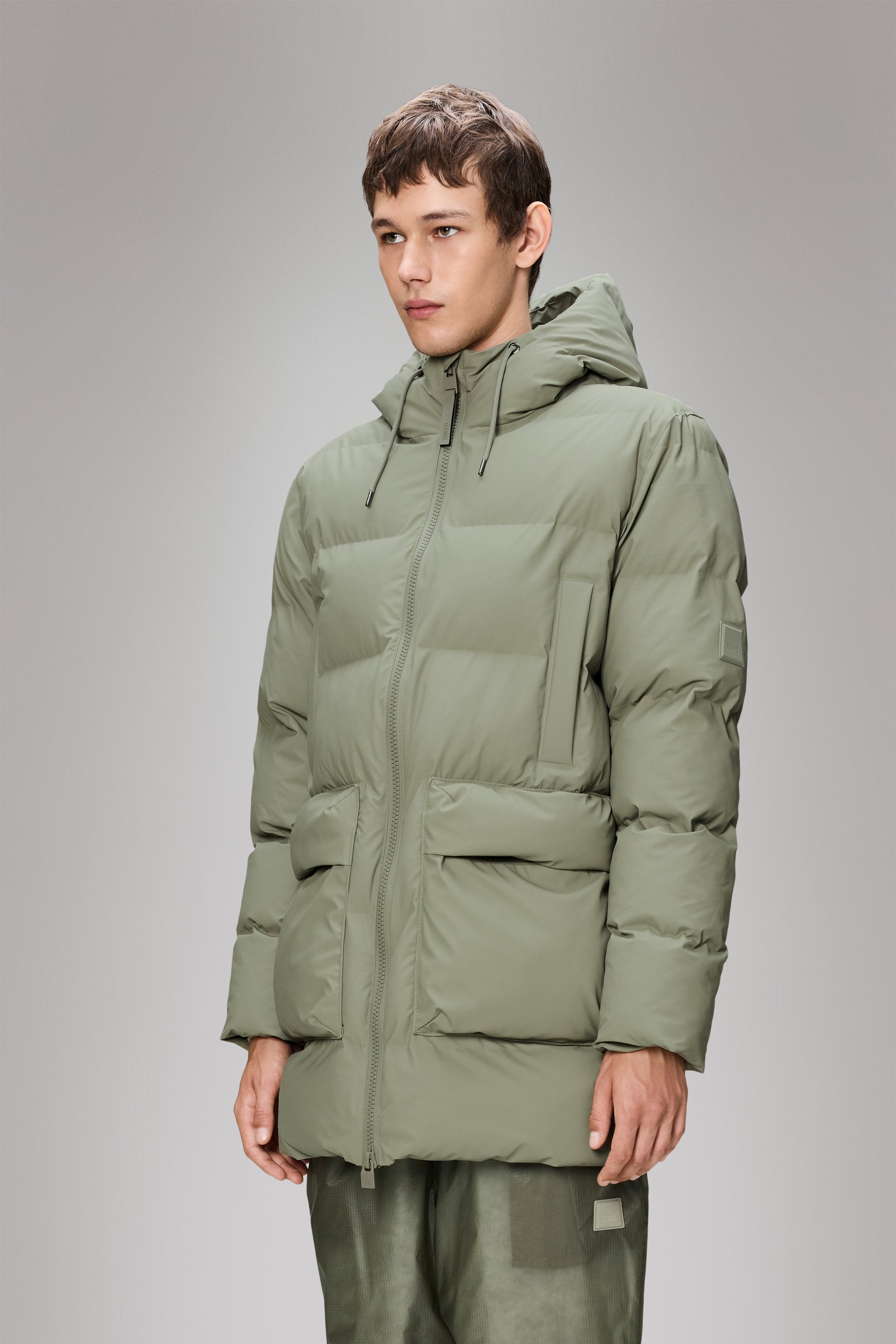 Rains - Cleane Winterjacke mit maximalem Wetterschutz